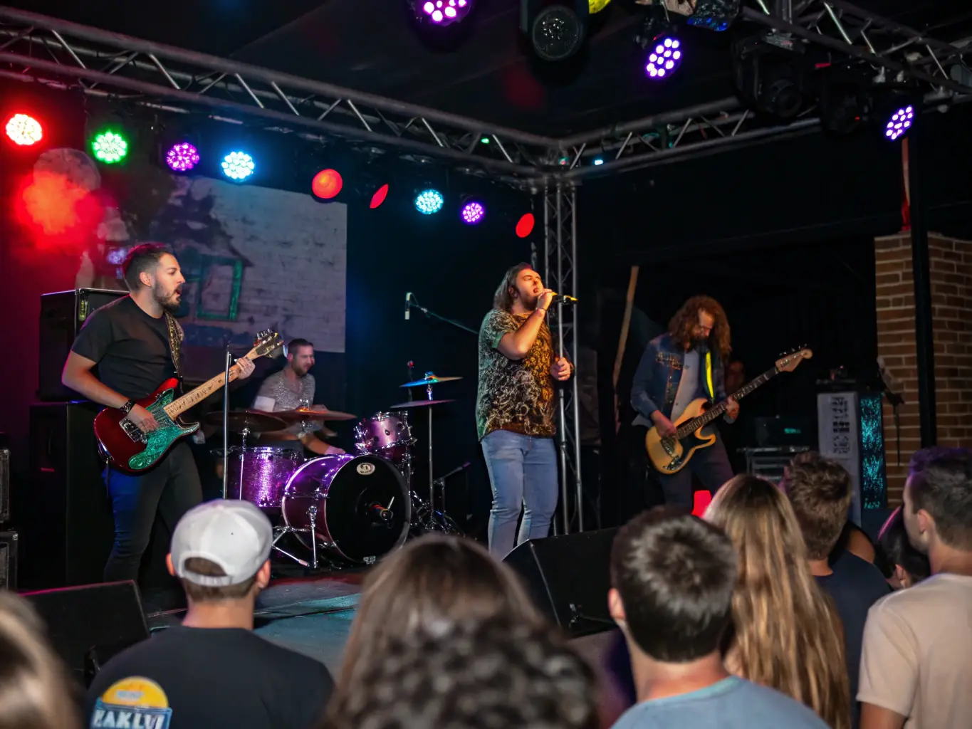 A vibrant concert scene with musicians performing on stage, showcasing ADM's commitment to concert organization and artistic expression.
